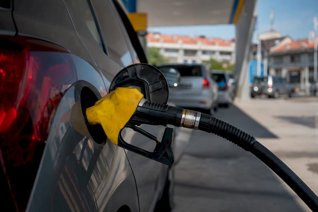 Fuel pump nozzle at Johor petrol station in daylight