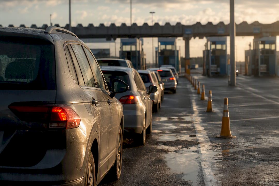Queue at border checkpoint road lane