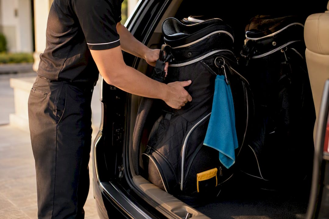 Golf bags being loaded for comfortable transfer