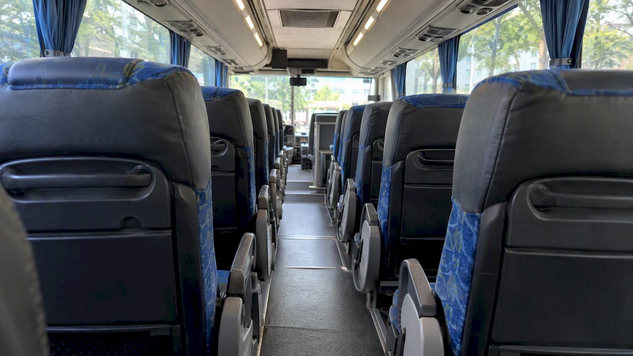 Reclining seats inside a charter coach cabin