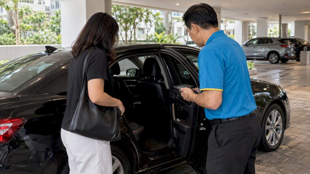 Traveler confirming a chauffeured sedan pickup