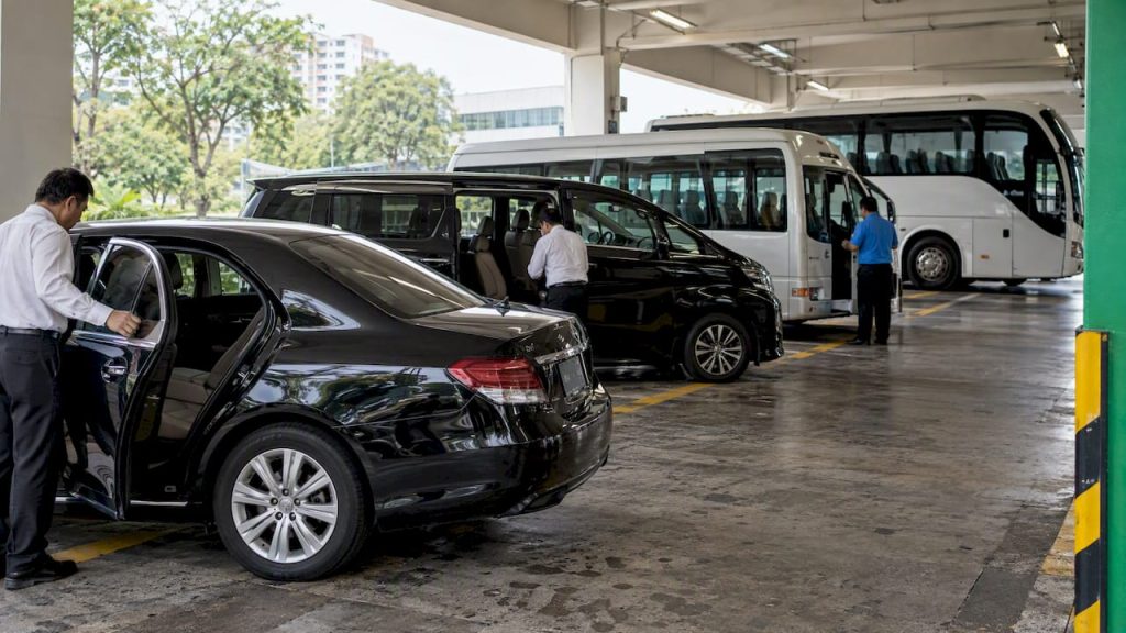 Sedan, MPV, minibus and coach at staging bay